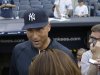 New York Yankees shortstop Derek Jeter, who is on the disabled list, talks to members of the media before an interleague baseball game  against the New York Mets at Yankee Stadium in New York, Wednesday, May 29, 2013. (AP Photo/Kathy Willens)