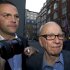 FILE - This Sunday July 10, 2011 file photo shows Chairman of News Corporation Rupert Murdoch, right, and his son James Murdoch, chief executive of News Corporation Europe and Asia arrive at his residence in central London. An influential group of British lawmakers say Rupert Murdoch is unfit to lead his global media empire, in a scathing report that says his company misled Parliament about the scale of phone hacking at one of its tabloids. Parliament's cross-party Culture, Media and Sport committee said Tuesday May 1, 2012, that News International, the British newspaper division of Murdoch's News Corp., had deliberately ignored evidence of malpractice, covered up evidence and frustrated efforts to expose wrongdoing. (AP Photo/Sang Tan, file)