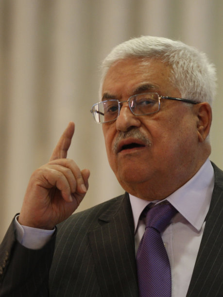 Palestinian President Mahmoud Abbas speaks during a religious ceremony for the end of the holy fasting month of Ramadan, in the West Bank city of Ramallah, Saturday, Aug 27, 2011. (AP Photo/Majdi Mohammed)