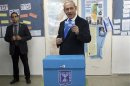 Israel's Prime Minister Netanyahu casts his ballot for the parliamentary election at a polling station in Jerusalem
