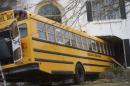 A school bus is pictured after it crashed into a house at the Windermere Development in Blue Bell, Pennsylvania