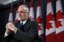 Canada's Auditor General Ferguson listens to a question during a news conference in Ottawa