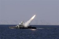 New medium-range missile fires from naval ship during Velayat-90 war game on Sea of Oman near Strait of Hormuz in southern Iran