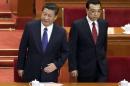 China's President Xi and Premier Li arrive for the opening session of the CPPCC at the Great Hall of the People in Beijing