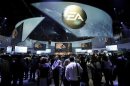 Attendees at Electronic Entertainment Expo visit the Electronic Arts booth on the first day of E3 in Los Angeles