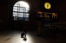 A commuter walks through Union Station, the heart of VIA Rail travel, on April 22, 2013 in Toronto, Canada