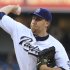 San Diego Padres starting pitcher Aaron Harang throws against the Los Angeles Dodgers during the first inning of a baseball game on Saturday, Sept. 24, 2011, in San Diego. (AP Photo/Lenny Ignelzi)
