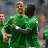 Bremen's striker Niclas Fuellkrug (L) and Bremen's Dutch midfielder Eljero Elia celebrate after a last penalty kick