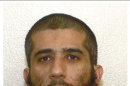 In this Sept. 17, 2007 photo released on Aug. 13, 2013 by defense lawyer U.S. Air Force Lt. Col. Barry Wingard, detainee Faez al-Kandari, 36, is shown in Guantanamo Bay U.S. Naval Base. Faez al-Kandari is a Kuwaiti who has been held for more than 11 years at the Guantanamo Bay prison. The Pentagon says the roughly 50 men in the indefinite detention category are held under international laws of war until the 