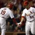 St. Louis Cardinals' Jaime Garcia, right, is congratulated by teammate Jon Jay after hitting a solo home run during the third inning of a baseball game against the Cincinnati Reds, Monday, Oct. 1, 2012, in St. Louis. (AP Photo/Jeff Roberson)