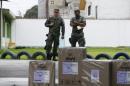 Peruvian soldiers patrol a polling station after election workers of Peru's National Office of Electoral Processes (ONPE) leave voting materials, in Surco, ahead of Sunday's presidential election, in Lima