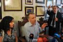 Brett (C) and Naghemeh King, the British parents of five-year-old Ashya King, speak to the press alongside their lawyer Juan Isidro Fernandez (R) in Seville on September 3, 2014 after their release from a Spanish prison