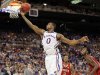 Kansas forward Thomas Robinson (0) shoots a layup during the first half of an NCAA tournament Midwest Regional college basketball game against North Carolina State, Friday, March 23, 2012, in St. Louis. (AP Photo/Jeff Roberson)
