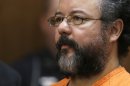FILE - This Aug. 1, 2013 file photo shows Ariel Castro in the courtroom during the sentencing phase in Cleveland. Castro, who held 3 women captive for a decade, has committed suicide, Tuesday, Sept. 3, 2013. (AP Photo/Tony Dejak, file)