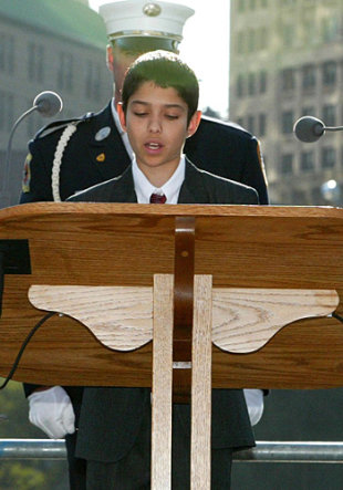 Peter Negron, 13, reads the poem &#39;Stars&#39; on Sept. 11, 2003, at the second anniversary of the WTC attacks.