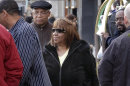 Singer Aretha Franklin leaves the Ritz Carlton Hotel on Wednesday, Feb. 22, 2012 in New York. Franklin says Cissy Houston raised her daughter Whitney Houston well and that an interview where Franklin said parents need to make sure children 