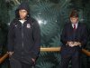 English rugby player Courtney Lawes, left, stands in an elevator with team legal counsel Richard Smith QC, after a disciplinary hearing in Auckland, New Zealand, Tuesday, Sept. 13, 2011. Lawes has been suspended for two weeks after being found guilty of recklessly striking an opponent with his knee in their first Rugby World Cup match against Argentina on Sept 10. (AP Photo/Dita Alangkara)