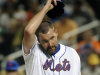 New York Mets' starting pitcher Mike Pelfrey wipes his head after giving up a single to start the fourth inning of the baseball game against the Washington Nationals at Citi Field in New York, Wednesday, Sept. 14, 2011. (AP Photo/Henny Ray Abrams)