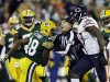 Field judge George Trout gets between Green Bay Packers' Randall Cobb (18) and Chicago Bears' J.T. Thomas (97) during the first half of an NFL football game Thursday, Sept. 13, 2012, in Green Bay, Wis. (AP Photo/Jeffrey Phelps)