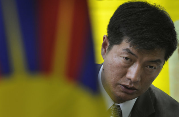 Newly elected head of the Tibetan government-in-exile Lobsang Sangay talks to the media after meeting with Tibetan activists on a hunger strike against blockade of the Kirti monastery in Sichuan province by Chinese forces, in New Delhi, India, Thursday, May 12, 2011. Sangay told reporters that his priorities as political leader of Tibetan exiles would include bringing more freedom to Tibet and seeing the Dalai Lama return to his homeland. The 43-year-old was elected by tens of thousands of Tibetans around the world last month after the 75-year-old Dalai Lama said he wanted to devolve political authority to an elected leader. 