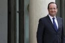 France's President Hollande waits for a guest at the Elysee Palace in Paris