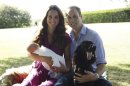 This image taken by Michael Middleton, the Duchess's father, in early August 2013 and supplied by Kensington Palace, shows the Duke and Duchess of Cambridge with their son, Prince George, in the garden of the Middleton family home in Bucklebury, England, with Tilly the retriever, seen left, a Middleton family pet, and Lupo, the couple's cocker spaniel. (AP Photo/Michael Middleton/TRH The Duke and Duchess of Cambridge ) EDITORIAL USE ONLY