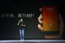 Lei Jun, founder and CEO of China's mobile company Xiaomi, speaks at launch ceremony of Xiaomi Phone 4 in Beijing