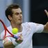 Murray of Britain hits a return to Stepanek of the Czech Republic during their men's singles quarterfinals tennis match at the Shanghai Masters tournament