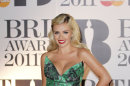 FILE - In this file photo dated Tuesday, Feb. 15, 2011 Katherine Jenkins arrives for the Brit Awards 2011 at The O2 Arena in London. Welsh opera star Katherine Jenkins has been rehearsing for 'Dancing With The Stars' in London and has found her love of high heels helps her on the dance floor. The Welsh mezzo-soprano has been rehearsing for the show with professional partner Mark Ballas, Monday, March 12, 2012. (AP Photo/Joel Ryan, file)
