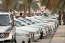 Saudi police cars are parked in central Riyadh on March 11, 2011