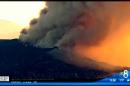 Wildfire burns homes near Glendora