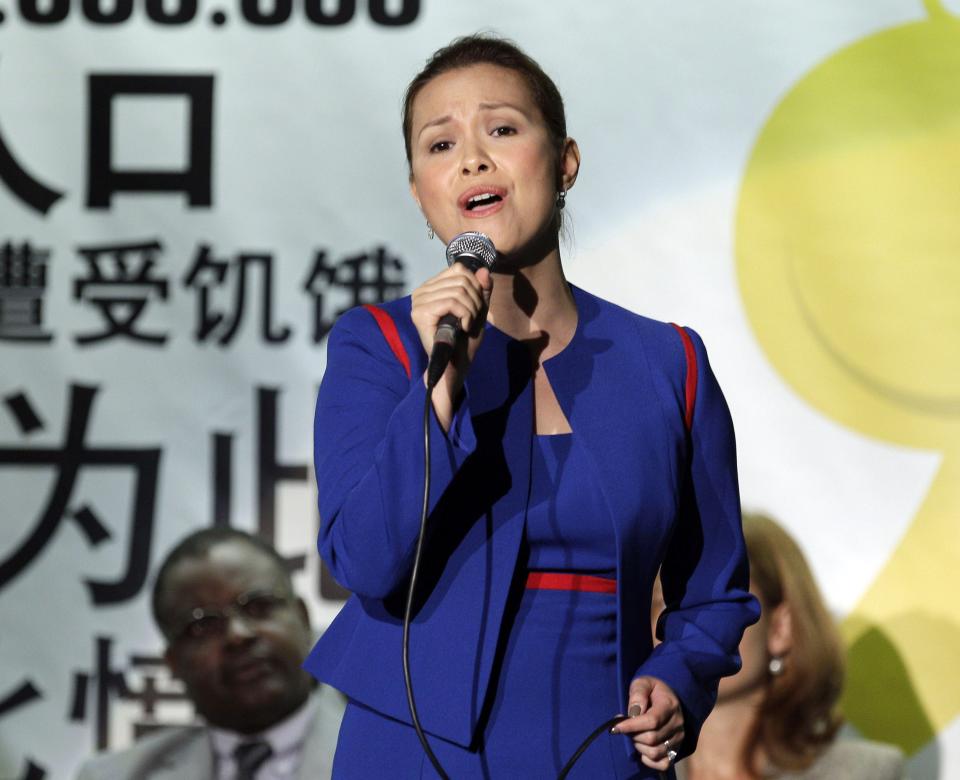 FILE - This Oct. 15, 2010 file photo shows Filipino singer Lea Salonga performing on World Food Day, at the FAO (United Nations Food and Agriculture Organization) headquarters in Rome. Salonga, the original &quot;Miss Saigon&quot; who also starred in a Broadway revival of &quot;Flower Drum Song&quot; in 2002, will join the upcoming tour &quot;Il Divo _ A Musical Affair: The Greatest Songs of Broadway Live.” The tour kicks off on March 28 in Phoenix. (AP Photo/Alessandra Tarantino, File)