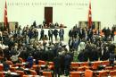 Turkish MPs vote on May 17, 2016 at the parliament in Ankara, during the discussion of the ruling AK Party's proposal regarding the amendment of immunity