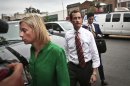 FILE - In a Thursday, July 25, 2013 file photo, New York mayoral candidate Anthony Weiner arrives with chief spokeswoman Barbara Morgan, left, at a campaign stop in New York. Morgan went on an expletive-laced tirade Tuesday, July 30, 2013 about former campaign intern Olivia Nuzzi in an interview with a political news website. Morgan later apologized for using vulgar language to describe Nuzzi and said she believed her interview with Talking Points Memo was off the record. (AP Photo/Bebeto Matthews, File)