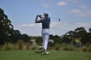Rory McIlroy of Northern Ireland tees off on the second day of the Australian Open golf tournament in Sydney on November 28, 2014