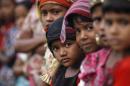 Rohingya Muslim children attend religious school at a refugee camp outside Sittwe