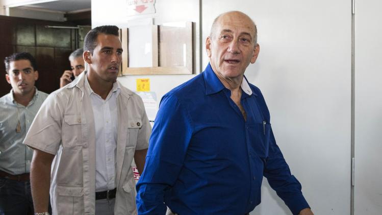 Former Israeli Prime Minister Ehud Olmert leaves Tel Aviv District Court