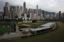 Luxurious residential blocks are seen behind Happy Valley horse racing track in Hong Kong