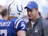 Indianapolis Colts' Peyton Manning (R) and quarterback Curtis Painter