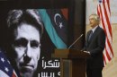 Visiting U.S. Deputy Secretary of State Burns speaks in front of a picture of slain U.S. ambassador to Libya Stevens during a ceremony commemorating Stevens in Tripoli
