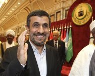 Iran's President Mahmoud Ahmadinejad arrives at the opening ceremony of the Organisation of Islamic Conference (OIC) summit in Mecca August 14, 2012. REUTERS/Susan Baaghil
