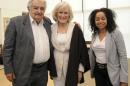 U.S actress Close poses with Uruguay's President Mujica and U.S ambassador Reynoso in Montevideo