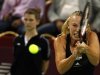 Wozniacki of Denmark hits a return to Pironkova of Bulgaria during their WTA Tournament of Champions semi-final match in Sofia