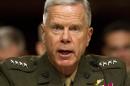 Marine Corps Commandant Gen. James Amos testifies on Capitol Hill in Washington, Thursday, Nov. 7, 2013, before the Senate Armed Service Committee hearing on the impact of sequestration on nation defense. (AP Photo/Jacquelyn Martin)