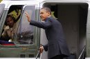 President Barack Obama waves as he boards Marine One helicopter on the South Lawn of the White House in Washington, Friday, March 30, 2012, as he travels to Vermont and Maine. (AP Photo/Charles Dharapak)