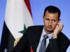 Syria's President Bashar al-Assad attends a news conference at the Elysee Palace in Paris