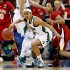 Notre Dame's Skylar Diggins and Maryland's Brene Moseley, rear, watch a loose ball during the first half of an NCAA womens' college basketball tournament regional final in Raleigh, N.C., Tuesday, March 27, 2012. (AP Photo/Gerry Broome)