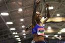 Meseret Defar of Ethiopia celebrates after winning the women's 3000m during on February 14, 2016 in Boston, Massachusetts