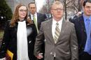 Former Blackwater Worldwide employee Paul Slough leaves federal court with his wife, December 8, 2008 in Salt Lake City, Utah