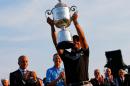 Jason Day of Australia celebrates with the Wanamaker trophy after winning the 2015 PGA Championship with a score of 20-under par at Whistling Straits on August 16, 2015